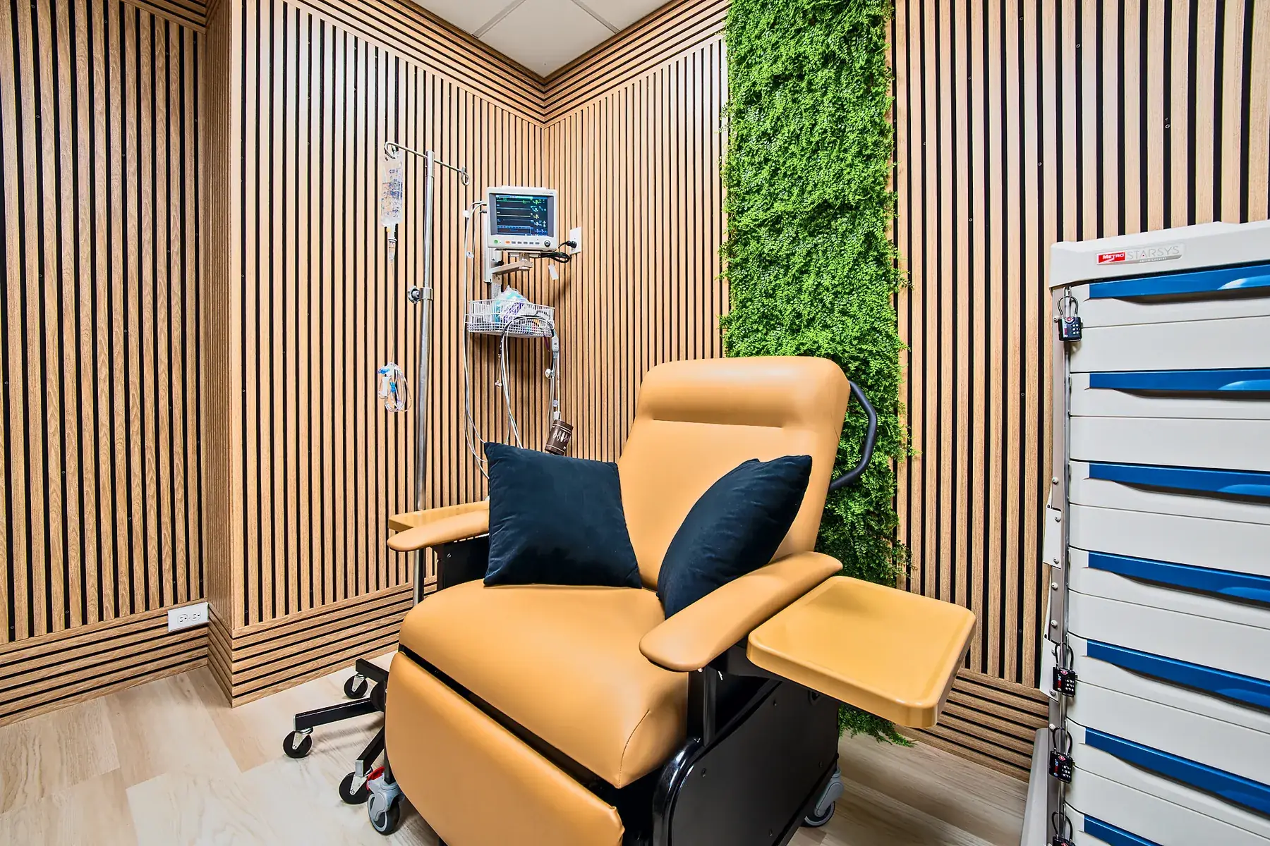 A treatment chair with its side table, ready for a patient